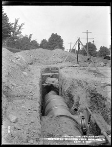 Distribution Department, Low Service Pipe Lines, Section 11, trench on Boston Avenue, station 350+, from the south, Medford, Mass., Sep. 8, 1897