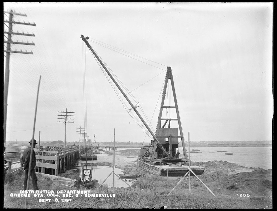 Distribution Department, Low Service Pipe Lines, Section 5, dredge at the south end of the Wellington Bridge, station 333+, from the south, Somerville, Mass., Sep. 8, 1897