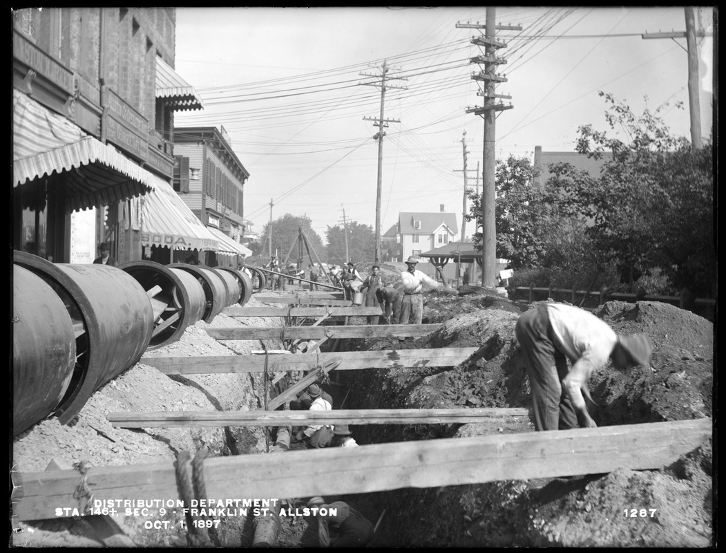 Distribution Department, Low Service Pipe Lines, Section 9, trench work on Franklin Street, station 146+, from the south, in Cambridge Street, Allston, Mass., Oct. 1, 1897