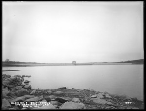 Sudbury Reservoir, upstream face of dam, gatehouse, from the west in basin, Southborough, Mass., Nov. 8, 1897