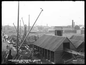 Distribution Department, Low Service Pipe Lines, Section 6, general view of crossing at Malden River on Medford Street, station 424, from the east on top of coal shed, Malden, Mass., Nov. 16, 1897