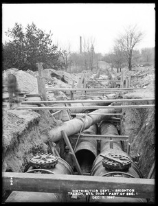 Distribution Department, Low Service Pipe Lines, part of Section 1, vertical curve and pipes under Boston Water Works mains, station 3+26, from the east, Brighton, Mass., Dec. 3, 1897
