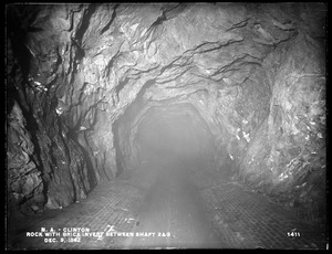 Wachusett Aqueduct, rock with brick invert, between Shafts No. 2 and No. 3, Section 2, from the east (interior), Clinton, Mass., Dec. 9, 1897