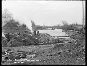 Wachusett Aqueduct, water in excavation above Stratton Bridge, Section 11, station 493+, from the east end of bridge, Marlborough, Mass., Dec. 16, 1897