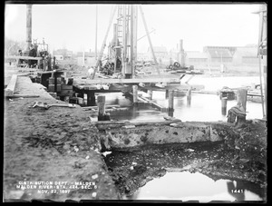 Distribution Department, Low Service Pipe Lines, Malden River crossing, Section 6, station 424, Medford Street, from the east bank showing where a portion of the bridge had been removed, Malden, Mass., Nov. 22, 1897