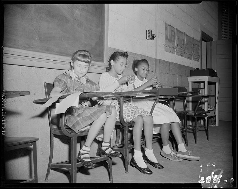 Three young girls sewing - Digital Commonwealth