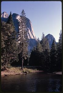 Water and trees with mountains in background, Yosemite Valley, California