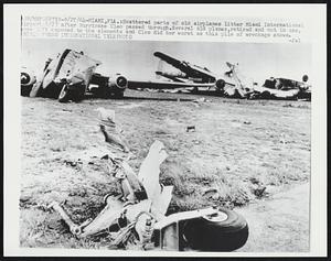 Scattered parts of old airplanes litter Miami International Airport 8/27 after Hurricane Cleo passed through. Several old planes, retired and not in use, were left exposed to the elements and Cleo did her worst as this pile of wreckage shows.
