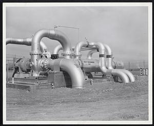 Heat Exchanger - General Electric Co. engineers and scientists have devised this system to transfer heat from water used to cool hige Hanford plutonoium plant reactors to air conditioning units in various Hanford buildings.