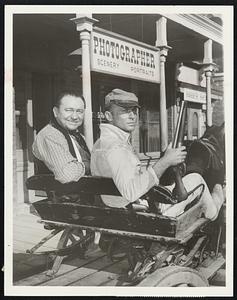 Taxi, Anyone? Nick Adams (right) and Tex Ritter wait for a native son to return home from territorial prison in "The Ballad of Danny Brown" on "The Rebel" tonight (Sunday) at 9 p.m. on channels 7-8