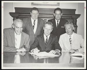 Planning National "Outdoor Amusement Week" to be proclaimed Aug. 11-17. Going over details with Secy. of State Kevin H. White (seated) is Nicholas Xanthanky of Salem (left) and Roger Shaheen.