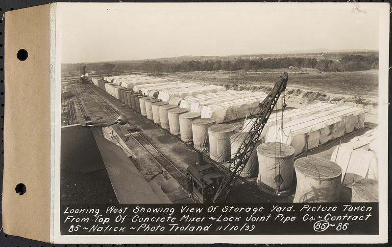 Contract No. 85, Manufacture and Delivery of Precast Concrete Steel Cylinder Pipe, Southborough, Framingham, Wayland, Natick, Weston, looking west showing view of storage yard, picture taken from top of concrete mixer, Natick, Mass., Nov. 10, 1939