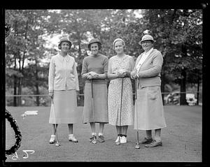 Four golfers