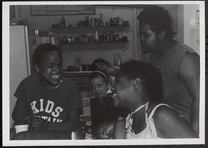 Group of young people in art room with Liz