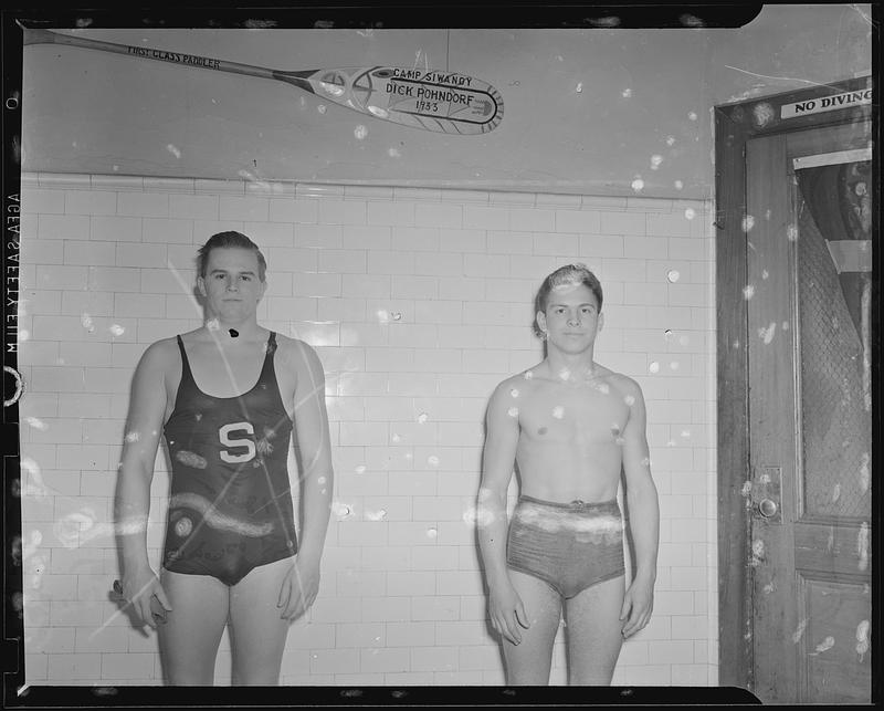 Two swimmers in pool locker room