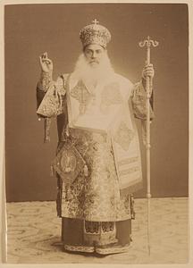 Studio portrait of clergyman in ornate vestments, possibly the Archbishop of Athens