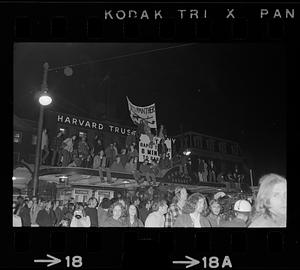 Harvard Square anti-war riot: Demonstrators and anti-war signs, Cambridge