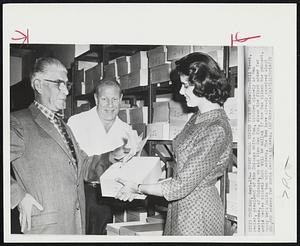 Start World Series Ticket Drawing--Bill Veeck, center, president of the Chicago White Sox, watches closely as ben Amsterdam, of Chicago, an old time Sox fan, draws the first order for world series tickets that will be mailed if the Sox clinch the pennant. Nancy Weis holds box with orders. The Sox have already received about 200,000 orders for World Series tickets.