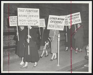Police Wives Picket Police Party--A first Corps Cadet Armory dinner for the State American Legion Commander hit a big hurdle last night when these pickets marched to protest a non-union caterer.