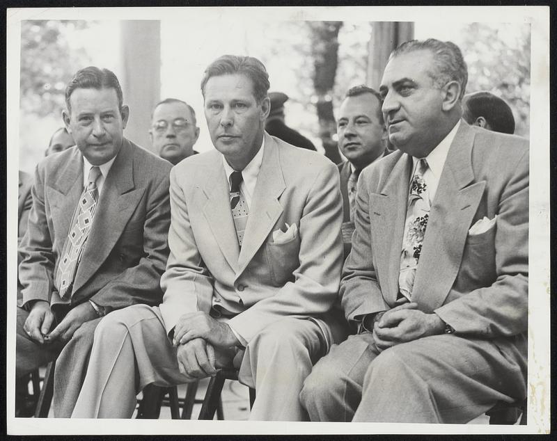 Labor Day Speakers at exercises on the Common yesterday morning included, left to right – Henry J. Brides, newly-elected president of the Massachusetts Federation of Labor; Secretary of Labor Maurice J. Tobin and John J. Del Monte, state commissioner of labor.