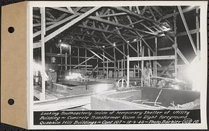 Contract No. 107, Quabbin Hill Recreation Buildings and Road, Ware, looking southeasterly inside of temporary shelter of utility building, concrete transformer room in right foreground, Ware, Mass., Dec. 9, 1940