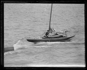 Sailboat with sail not yet unfurled