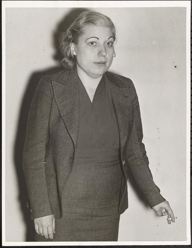 Karpis case blonde arrested by G-men
