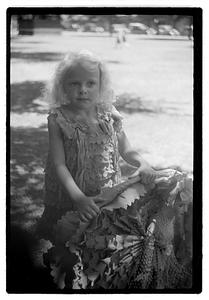 Girl holding decorated hoop