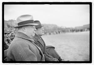 Boston Parks Department Commissioner William Long watching a football game, Back Bay Fens