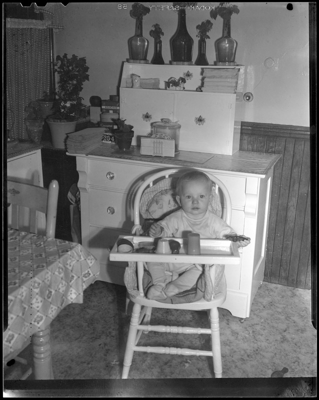 Dyan in high chair