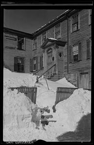 Walkway and stairs covered in snow [possibly the King Hooper Mansion]