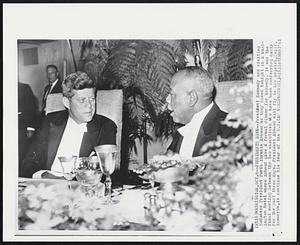 Presidents Dine-- President Kennedy and visiting Sudanese President Ferik Ibrahim Abboud as they dined tonight in a Washington hotel where Abboud gave a formal dinner for Kennedy. It was the final meeting between the two executives who have been conferring daily for the past three days. President Abboud will fly to Los Angeles, Calif. tomorrow, to continue his tour of the U.S.