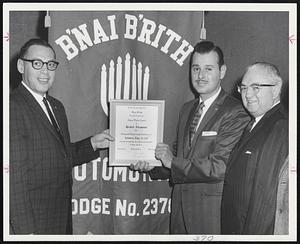 District Chain Maker Award was presented to Herbert A. Abramson, Automotive Lodge of B’nai B’rith president. His work in the creation of this lone type lodge was why he was chosen. From left, Harold Snyder, district deputy; Abramson, and Clement A. Riley, motor vehicle registrar.