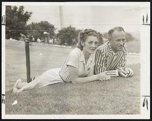 Denny Shute’s Main Supporter at the now famous Pomonok tee party is none other than Mrs. Denny Shute and here we find the couple relaxing between Denny’s rounds of golf and executive sessions concerning his eligibility to play.