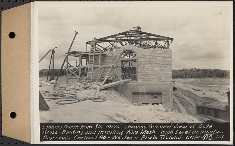 Contract No. 80, High Level Distribution Reservoir, Weston, looking north from Sta. 19+75 showing general view of gatehouse, riveting and installing wire mesh, high level distribution reservoir, Weston, Mass., Jun. 21, 1940