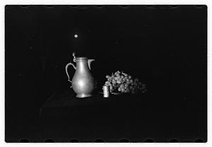 Grapes by a pitcher