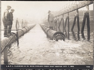 Distribution Department, Low Service Pipe Lines, cleaning 24-inch main, Chelsea Creek, East Boston, Mass., Oct. 7, 1914