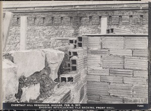 Distribution Department, Chestnut Hill Reservoir, garage, showing interlocking tile backing, front wall, Brighton, Mass., Feb. 8, 1917