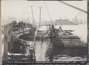 Distribution Department, Low Service Pipe Lines, repairing leaks in 36-inch submerged mains, Malden River, Malden, Mass., Mar. 7, 1917