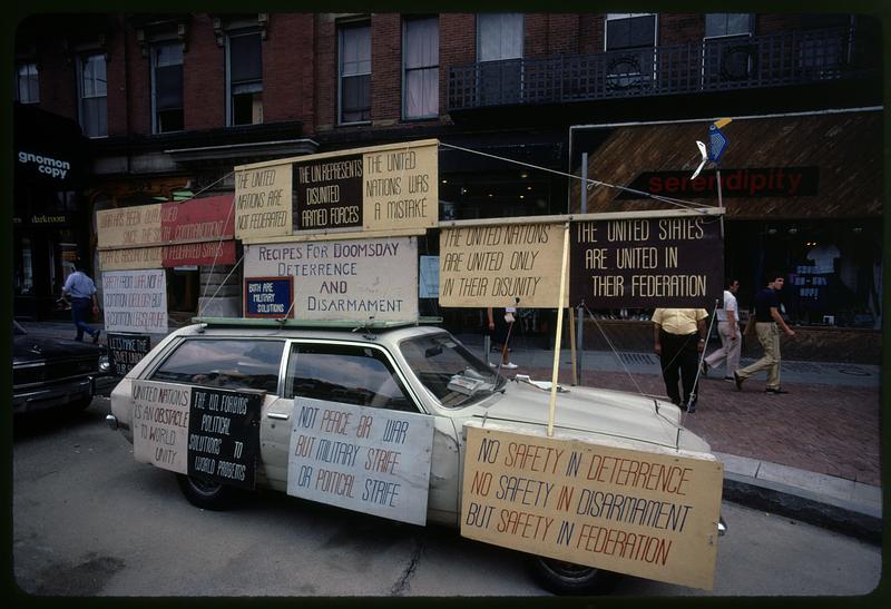 Libertarian signs on car, Harvard Square, Cambridge