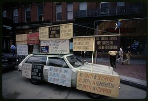 Libertarian signs on car, Harvard Square, Cambridge