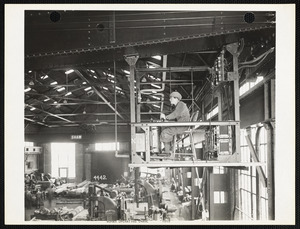 Woman operating crane