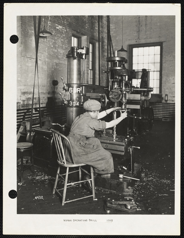 Woman operating drill