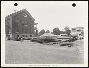 Steel stored at side of carpenter shop