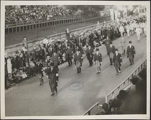 Cavalier Frank Ciambelli, Chief Marshall of parade. Chief of Staff, aides and honorary aides marching down Beacon St.