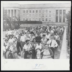 They're Hurrying Home Ahead of Ione -- Government employes leaving the Pentagon in Washington, a precaution taken principally to ease traffic as hurricane Ione appeared to be headed straight for the nation's capital. Many schools in the area dismissed early, too, and evening events were cancelled.