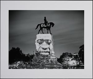 The Robert E. Lee Monument with a projection of George Floyd by artist Dustin Klein