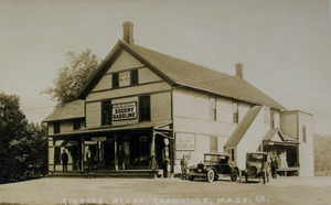 Gibbons store with car and truck out front