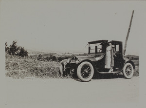 Unidentified woman with car, 121