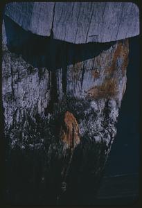 Close view of wooden post with water stains